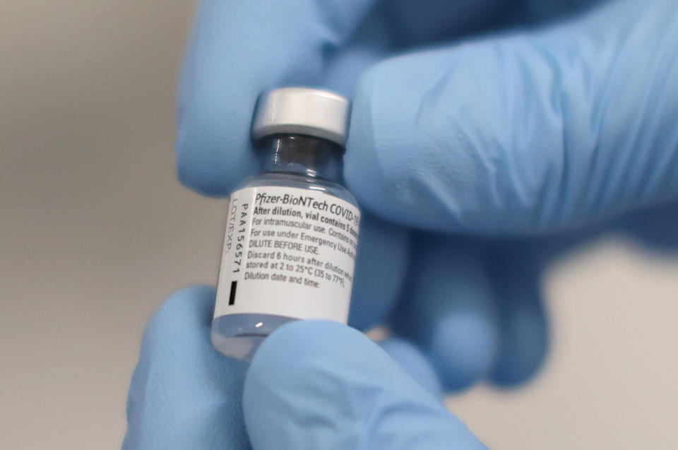 File photo dated 08/12/2020 of a phial of the Pfizer/BioNTech Covid-19 vaccine ahead of being administered at the Royal Victoria Hospital, in Belfast, on the first day of the largest immunisation programme in the UK's history. Saturday January 30 marks the one year anniversary of the earliest known death from coronavirus in UK. Issue date: Wednesday January 27, 2021.