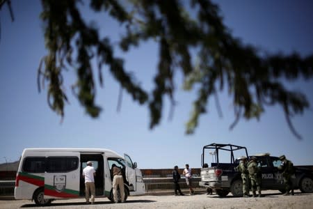 Agents of the National Immigration Institute (INM) and members of the Mexican National Guard are seen at the U.S. and Mexico border, in Ciudad Juarez