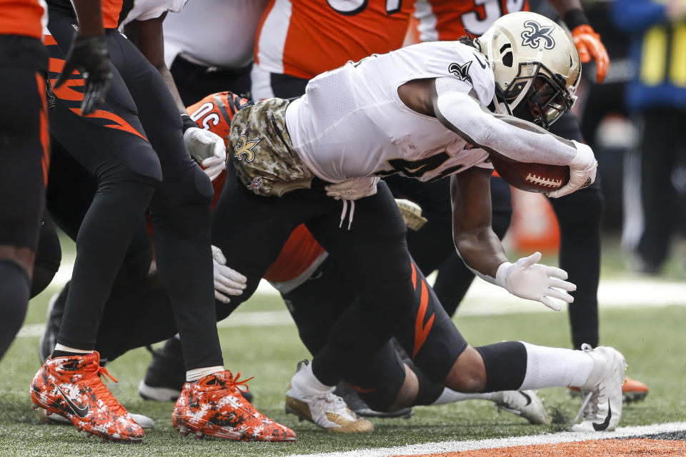 New Orleans Saints running back Alvin Kamara dives in for a touchdown in the first half of an NFL football game against the Cincinnati Bengals, Sunday, Nov. 11, 2018, in Cincinnati. (AP Photo/Gary Landers)