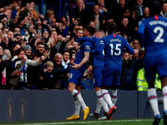 Olivier Giroud celebrates after scoring the fourth for Chelsea (AFP)