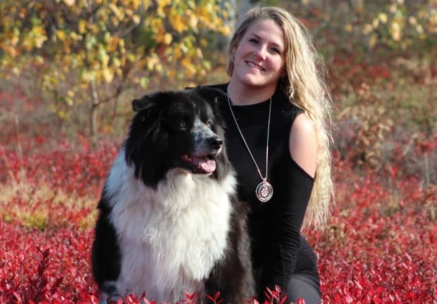 Hillary Hooper, seen here with her beloved dog, Blue, died by suicide at the Saint John Regional Hospital in December after numerous attempts to get help for depression.  (Submitted by Patty Borthwick - image credit)