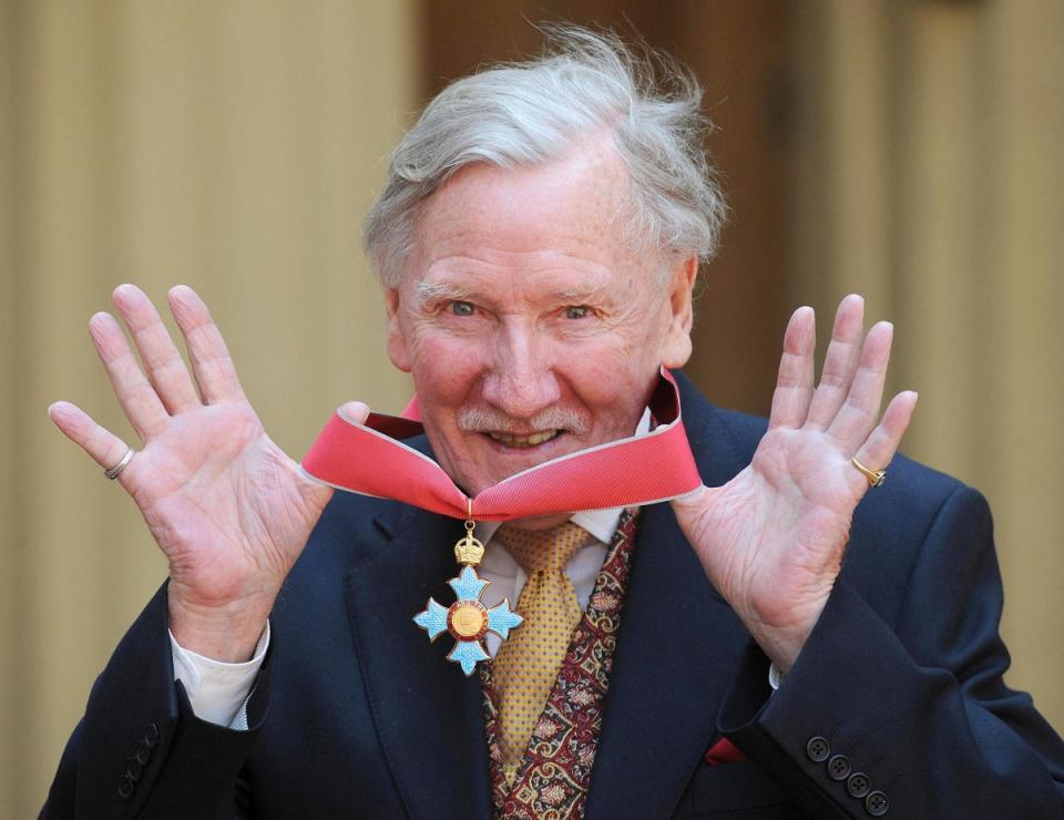 With his CBE, which was given to him by the Queen in 2008 (PA)