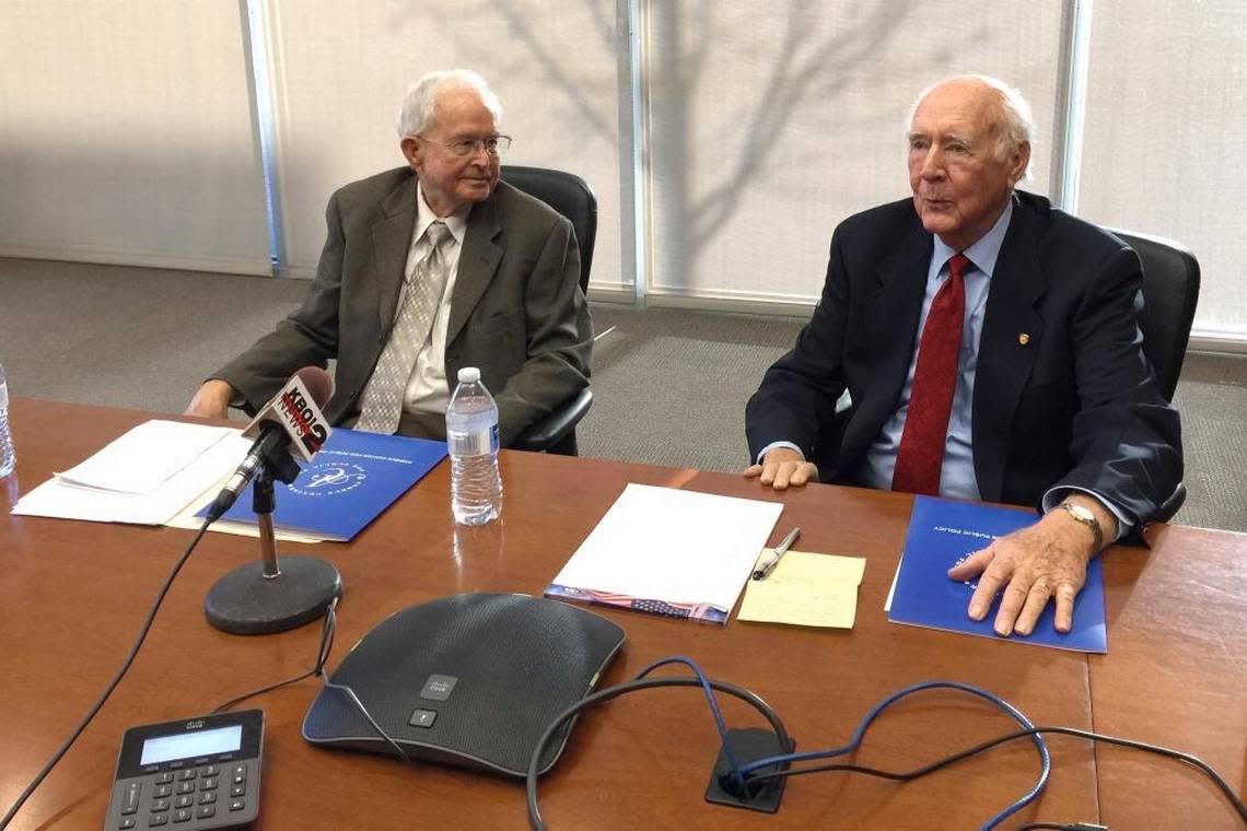 Former Idaho Govs. Phil Batt, left, and Cecil Andrus in 2015 at a press conference to protest a proposal to bring spent nuclear fuel rods to the Idaho National Laboratory for research. Keith Ridler/AP