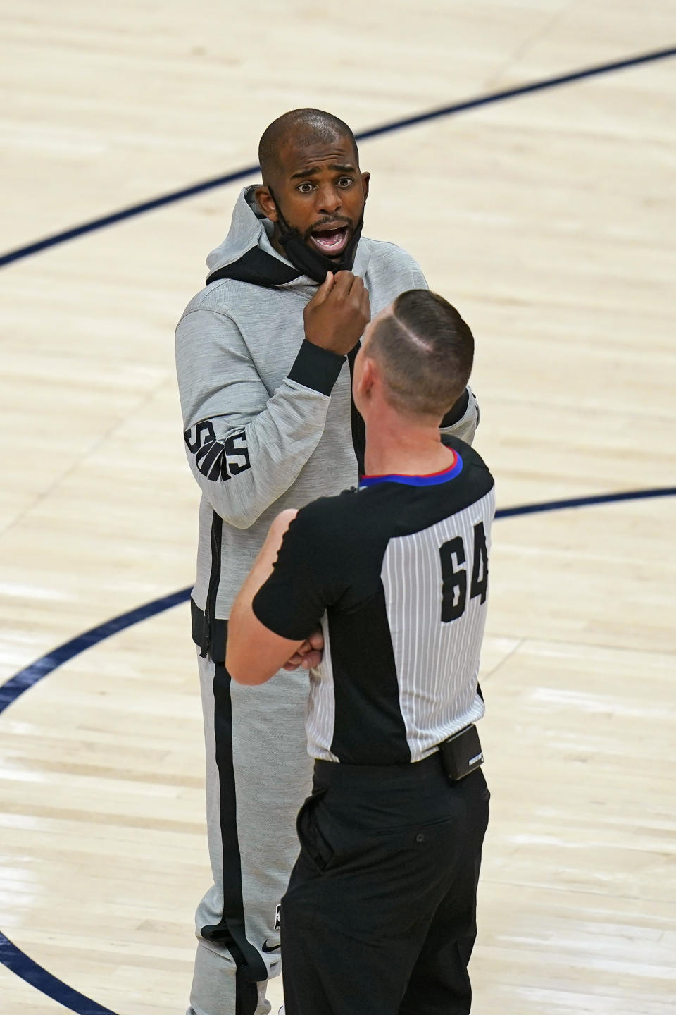 Phoenix Suns guard Chris Paul talks with referee Justin Van Duyne during the second half of the team's NBA preseason basketball game against the Utah Jazz on Saturday, Dec. 12, 2020, in Salt Lake City. (AP Photo/Rick Bowmer)