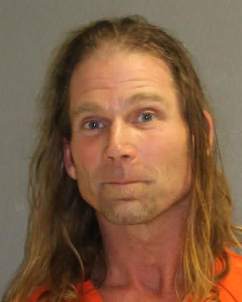 Robert Burck, 50, known as the "Naked Cowboy" was charged with aggressive panhandling on March 6 during Bike Week in Daytona Beach.