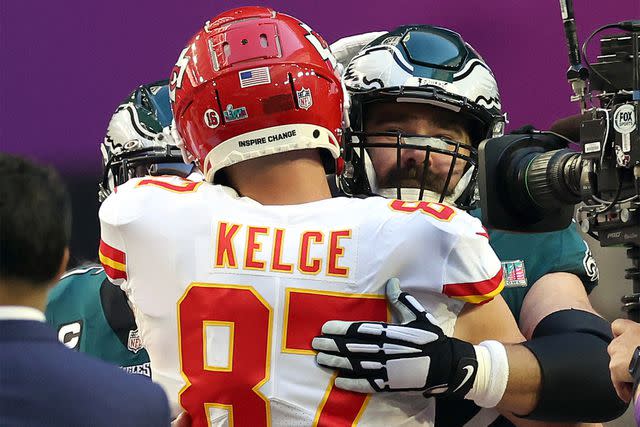 Ezra Shaw/Getty Travis Kelce #87 of the Kansas City Chiefs hugs Jason Kelce #62 of the Philadelphia Eagles before Super Bowl LVII at State Farm Stadium on February 12, 2023