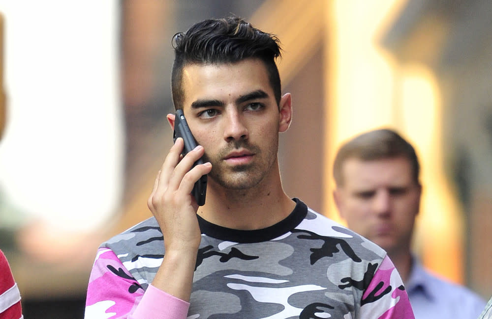 Joe Jonas' DNCE confirm new music as trio credit:Bang Showbiz