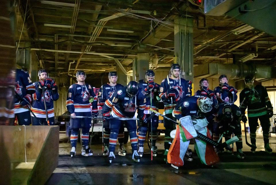 The Peoria Rivermen gather for player introductions before the start of Game 2 of the SPHL quarterfinals Saturday, April 15, 2023 at Carver Arena. The Rivermen advanced to the semifinals with a 2-1 win over Pensacola.