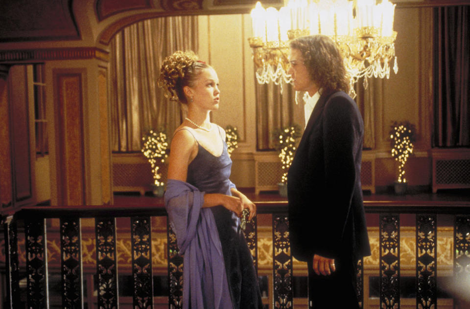 <p>Cat Stratford (Julia Stiles) looks perfectly ’90s in this light royal blue dress that she claims she just had lying around. Heath Ledger looks perfect without the bow tie, which sums up how badass dreamy he was without trying. (Photo: Everett Collection) </p>