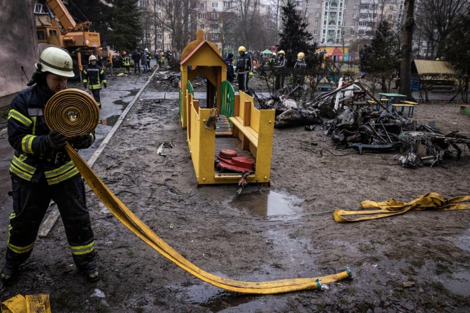 Emergency services at the scene of the helicopter crash (Getty Images)