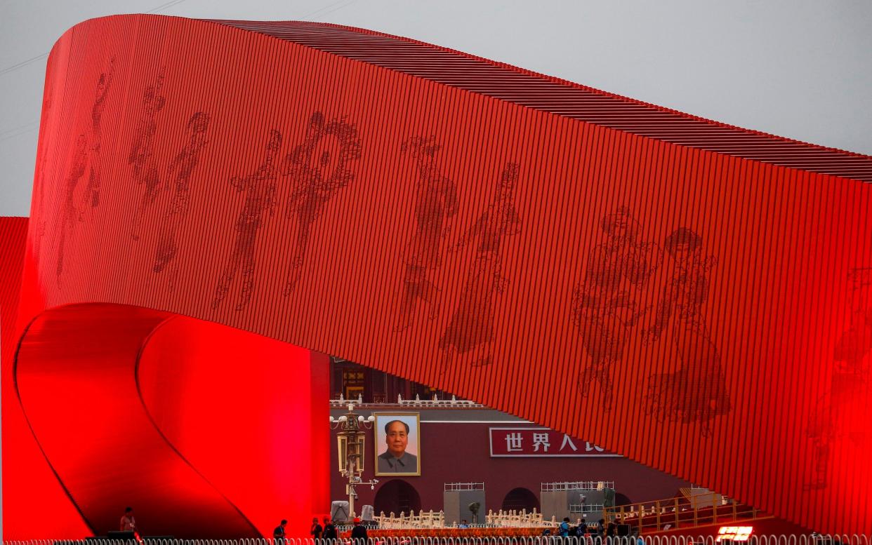 Tiananmen Square is prepared for the parade for the 70th anniversary of the People's Republic of China - AP