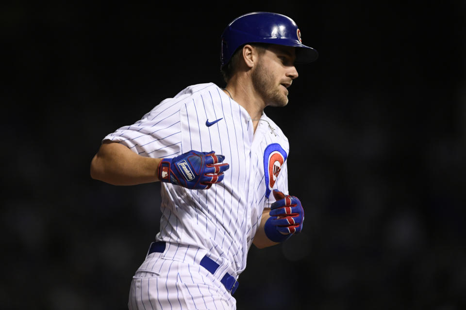 Chicago Cubs' Patrick Wisdom rounds the bases after hitting a solo home run during the eighth inning of a baseball game against the Cleveland Indians Tuesday, June 22, 2021, in Chicago. Chicago won 7-1. (AP Photo/Paul Beaty)