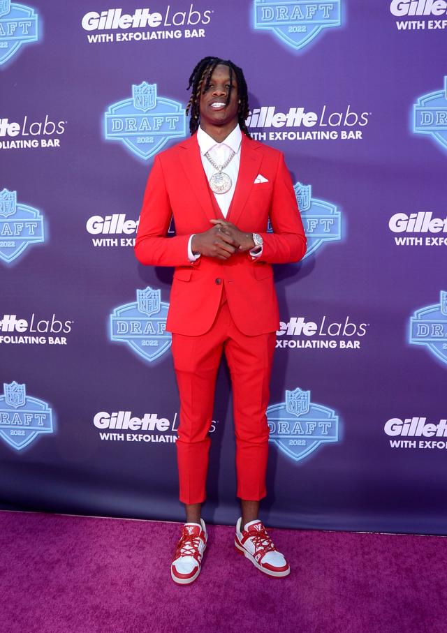 Jameson Williams Goes Red-Hot in Highwater Pants & Louis Vuitton x Virgil  Abloh Sneakers to NFL Draft 2022
