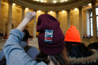 <p>Lindsay Chestnut, of Baltimore, Md., raises a fist in solidarity as people participate in civil disobedience in support of the Deferred Action for Childhood Arrivals (DACA) program, in the Russell Rotunda, Wednesday, Feb. 7, 2018, on Capitol Hill in Washington. (AP Photo/Jacquelyn Martin) </p>