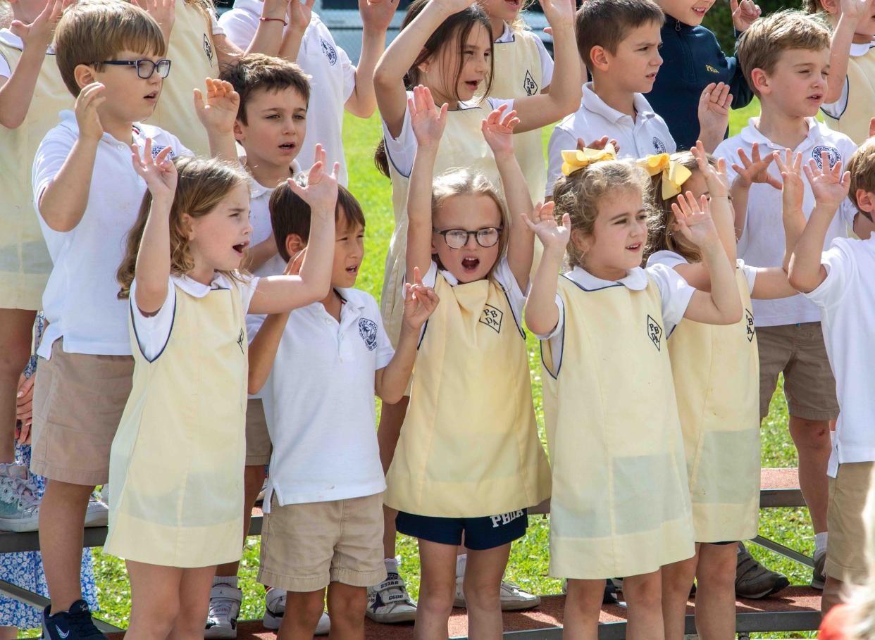 Kindergarten students perform songs during Grandparents and Special Friends Day at Palm Beach Day Academy's lower school December 5, 2023.