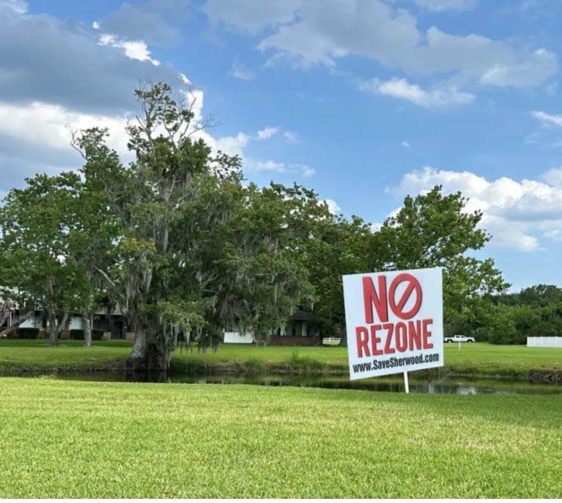 A sign declaring "No Rezone" to stop progress on turning the Sherwood Golf Course into a new residential subdivision.