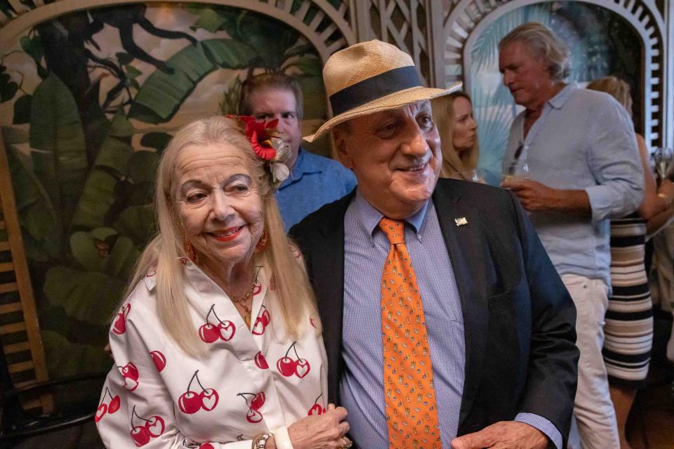 Arlette Gordon says goodbye to Franklyn de Marco (r) and his iconic restaurant and watering hole, Ta-boo, which is closing down after more than 80 years in Palm Beach May 28, 2023. 