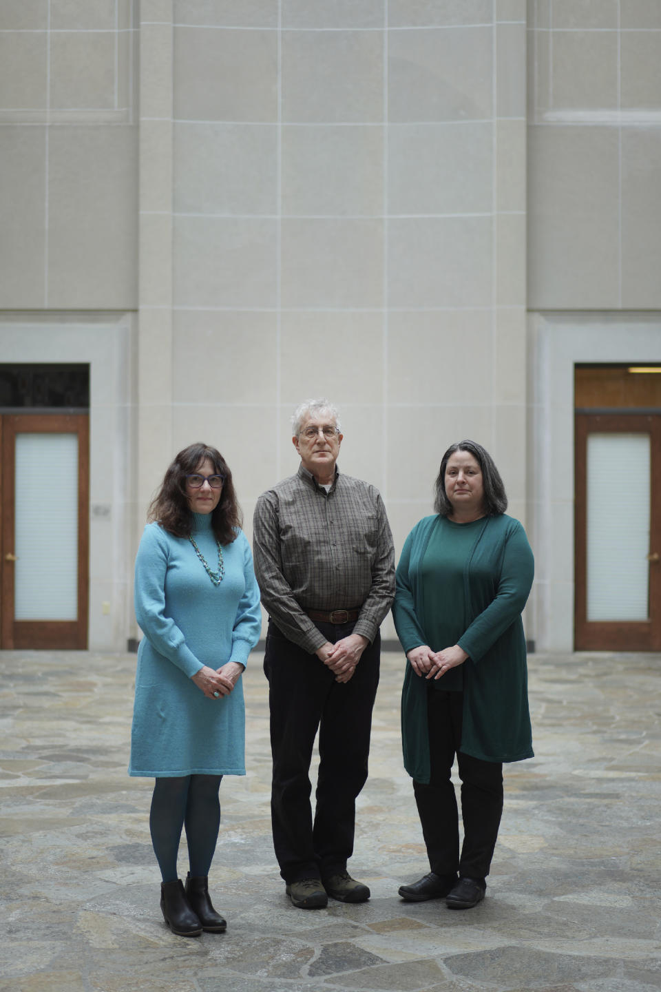 From left; Jo Recht, president of the Board of Directors at Dor Hadash, Rich Weinberg, chair of the social action committee, and Dana Kellerman, chair of communications stand together for a portrait at their current home in Rodef Shalom Congregation, on Monday, April 17, 2023, in Pittsburgh, Pa. (AP Photo/Jessie Wardarski)