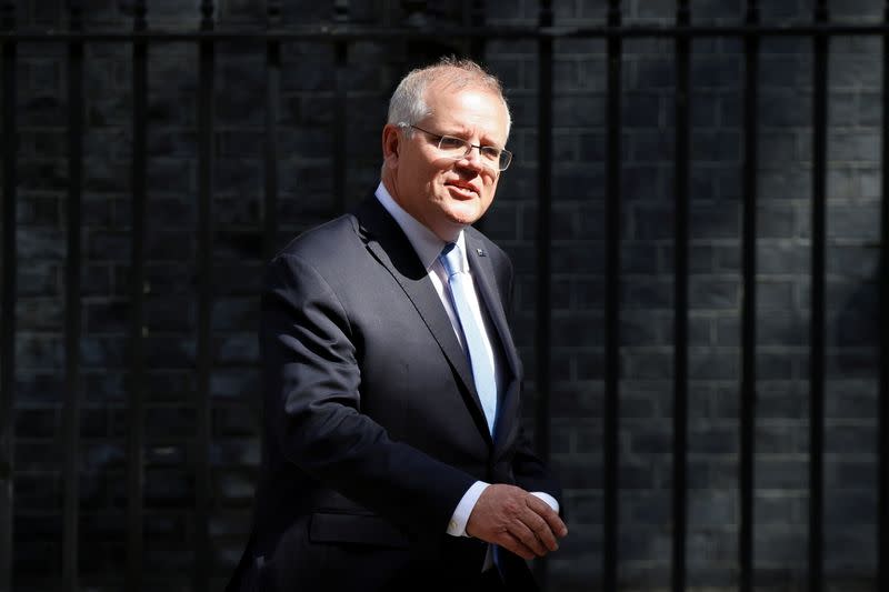 FILE PHOTO: British PM Johnson meets Australian counterpart Morrison in London