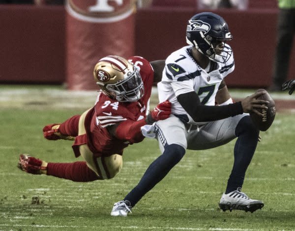 Seattle Seahawks quarterback Geno Smith (R) should be a fantasy football starter in Week 2. File Photo by Terry Schmitt/UPI