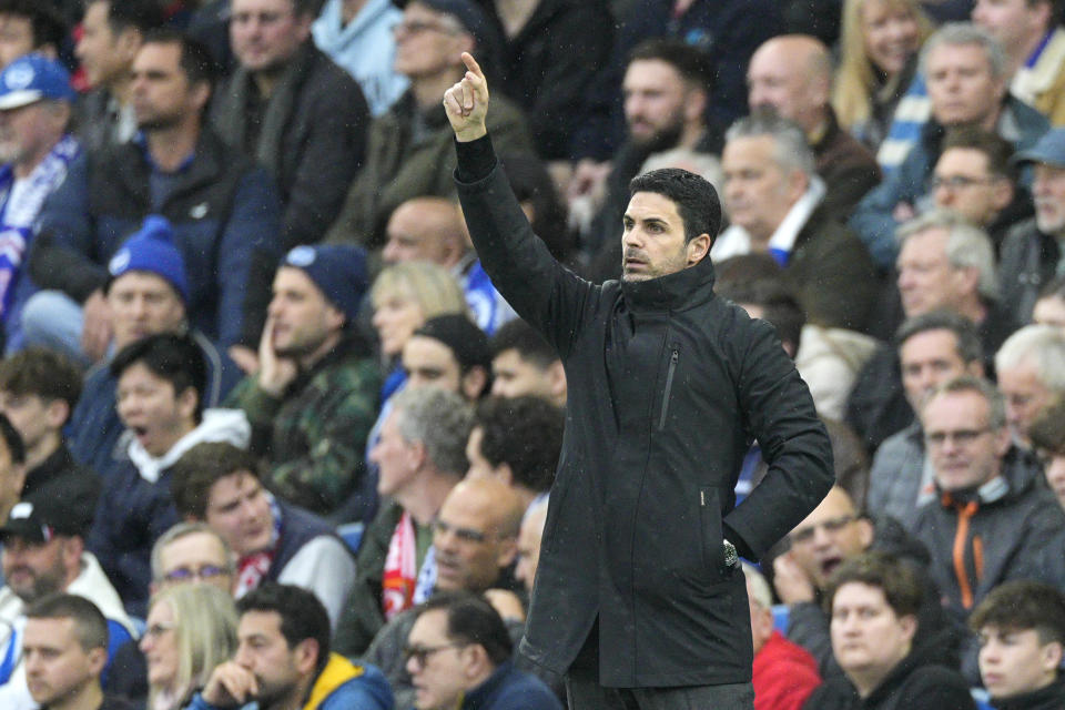 Arsenal's manager Mikel Arteta gives instructions from the side line during the English Premier League soccer match between Brighton and Hove Albion and Arsenal at the American Express Community Stadium in Brighton, England, Saturday, April 6, 2024. (AP Photo/Dave Shopland)