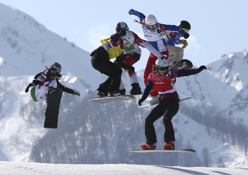 ADDS IDS OF OTHER BOARDERS - Czech Republic's Eva Samkova, bottom right, leads the field in the women's snowboard cross final at the Rosa Khutor Extreme Park, at the 2014 Winter Olympics, Sunday, Feb. 16, 2014, in Krasnaya Polyana, Russia. Samkova went on to win the gold medal. The other boarders are, from left, Italy's Michela Moioli, Bulgaria's Alexandra Jekova, Canada's Dominique Maltais, France's Chloe Trespeuch, and United States' Faye Gulini. (AP Photo/Luca Bruno)
