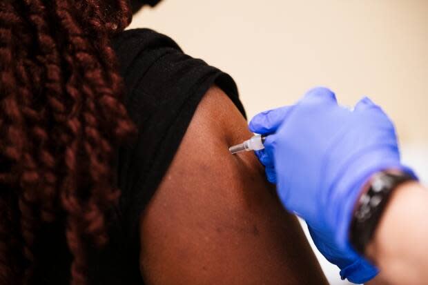 Some public health experts say failing to prioritize the inoculation of racialized communities will put them at greater risk of getting COVID-19 and could increase the virus's spread.