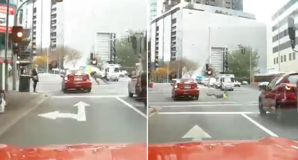 The man was flung onto the road after being hit by the car. Source: Facebook/Dash Cam Owners Australia