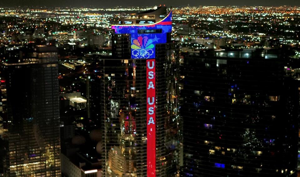 The World’s Tallest Digital NBC Olympic Peacock Logo Lights-Up the 700-foot-tall Paramount Miami Worldcenter skyscraper in downtown Miami as a Tribute to Team USA from The Royal Palm Companies Development Firm and WTVJ-TV-NBC-6. (Bryan Glazer | World Satellite Television News)