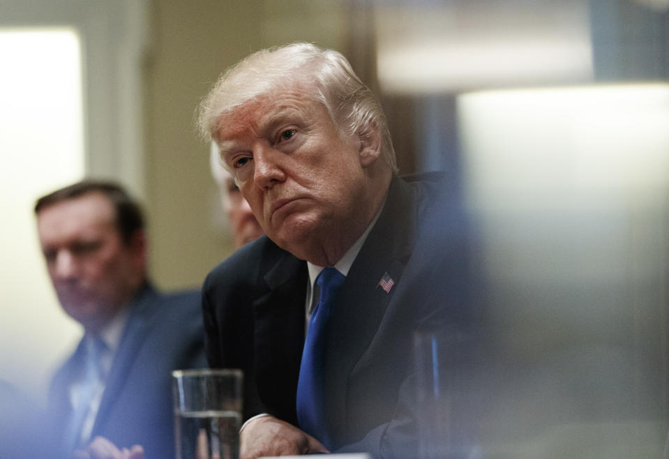 President Trump pauses during a meeting in the Cabinet Room of the White House on Wednesday. (AP Photo/Carolyn Kaster)