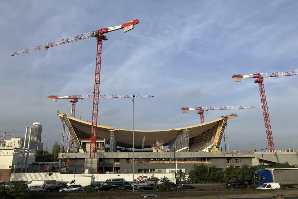 FILE - The aquatic center that will host the artistic swimming, water-polo and diving competitions for Paris Olympic Games in 2024 is under construction in Saint-Denis, north of Paris, Wednesday, Oct.19, 2022. (AP Photo/Bertrand Combaldieu, File)