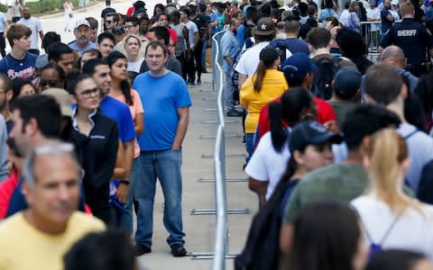 Army of volunteers line the streets to help Hurricane Harvey victims 