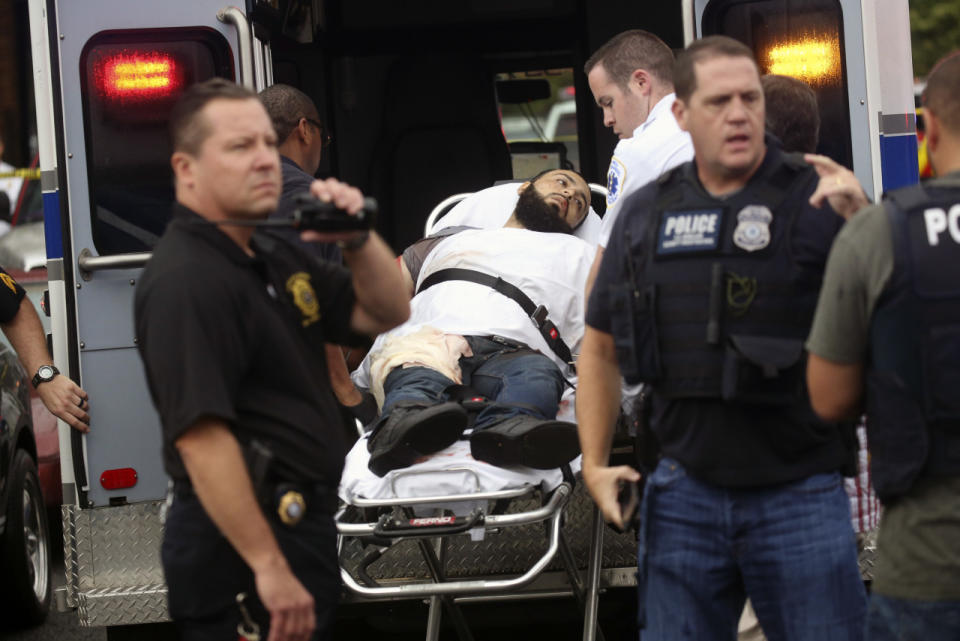 Ahmad Khan Rahami is taken into custody after a shootout with police in Linden, N.J. Rahami was wanted for questioning in the bombings that rocked the Chelsea neighborhood of New York and the New Jersey shore town of Seaside Park. (Nicolaus Czarnecki/Boston Herald via AP)