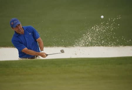 Jose Maria Olazabal of Spain chips from a sand trap onto the second green during second round play of the Masters golf tournament at the Augusta National Golf Course in Augusta, Georgia April 10, 2015. REUTERS/Phil Noble