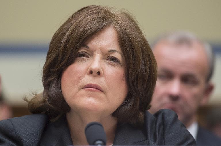 Former director of the United States Secret Service Julia Pierson testifies before the House Oversight and Government Reform Committee on Capitol Hill in Washington, DC September 30, 2014