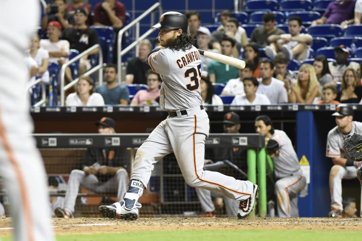 Brandon Crawford tied an NL record with seven hits in a single game. (Getty Images/Eric Espada)