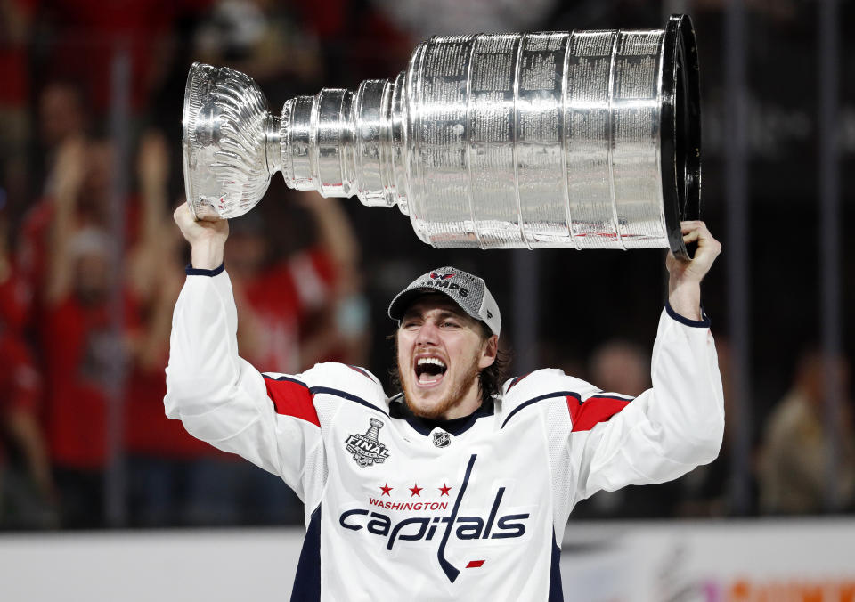 Washington Capitals right wing T.J. Oshie hoists the Stanley Cup after the Capitals defeated the Golden Knights 4-3 in Game 5 of the NHL hockey Stanley Cup Finals Thursday, June 7, 2018, in Las Vegas. (AP Photo/John Locher)