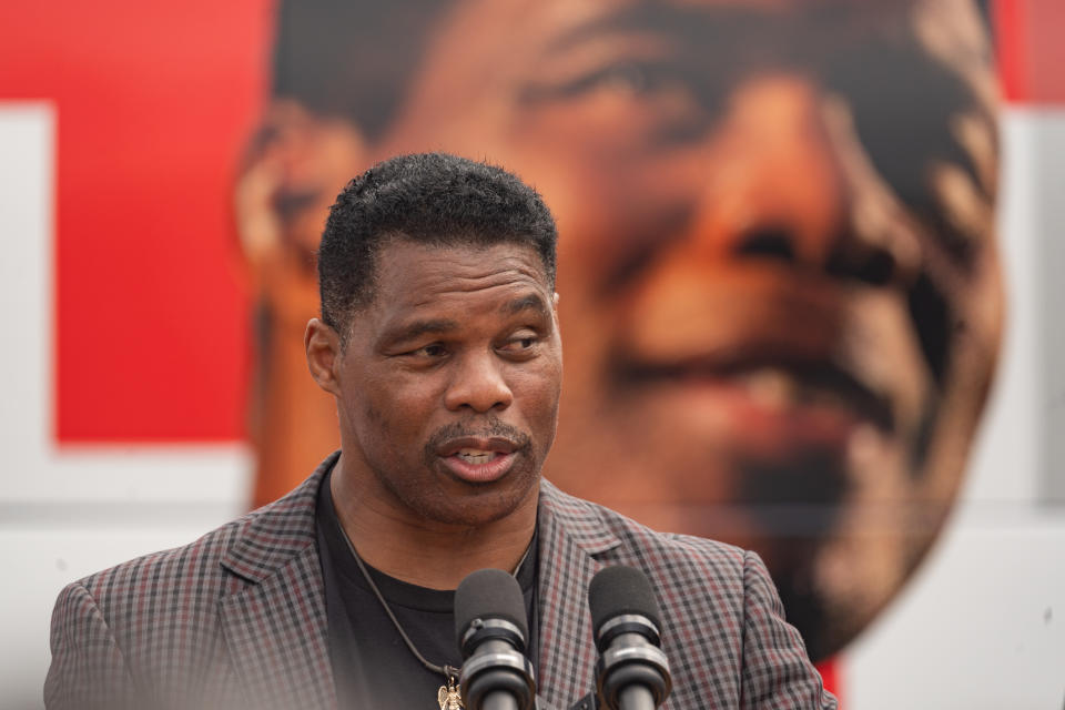 Herschel Walker speaks at a campaign event.