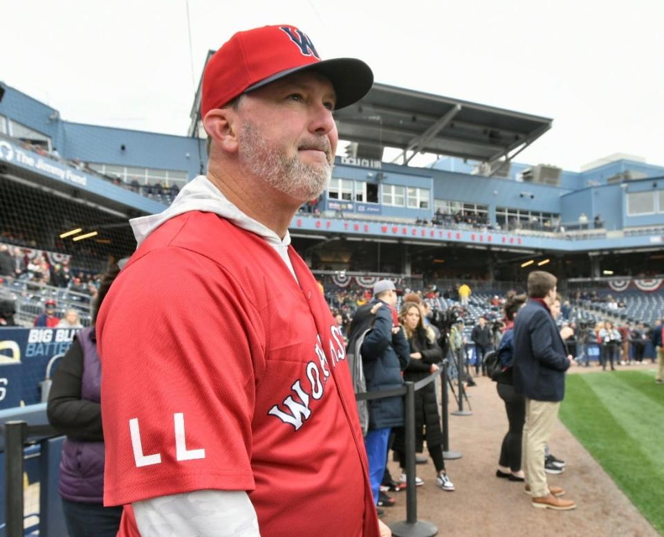 Worcester Red Sox players, including Boston Red Sox legend Trot Nixon, wear LL on their jerseys to honor Larry Lucchino. Nixon threw out the ceremonial first pitch.