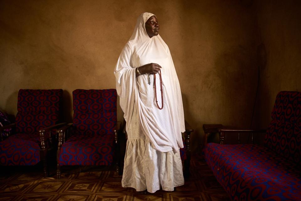 Houssa Nientao, 64, is one of the few female Muslim monks, also known as "marabouts," in Bamako, Mali. Here she poses in a room on&nbsp;Feb. 20, 2018.