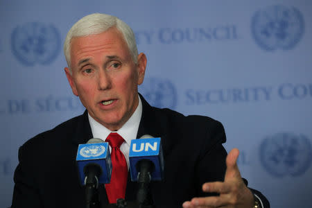 U.S. Vice President Mike Pence speaks to reporters outside the United Nations Security Council at U.N. headquarters in New York, U.S., April 10, 2019. REUTERS/Brendan McDermid