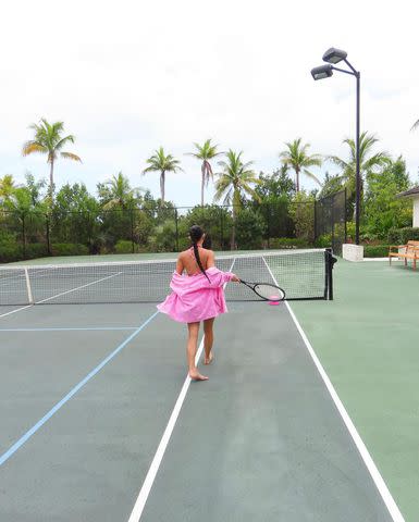 <p>Kim Kardashian/Facebook</p> Kim Kardashian poses for an Instagram photo on the tennis court.