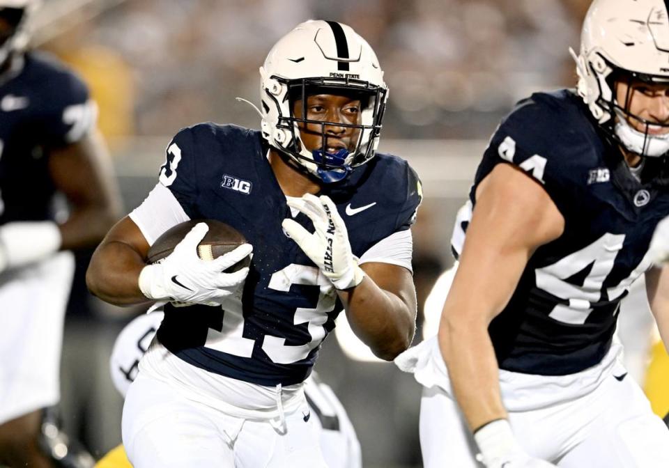 Penn State running back Kaytron Allen runs with the ball during the game against West Virginia on Saturday, Sept. 2, 2023.