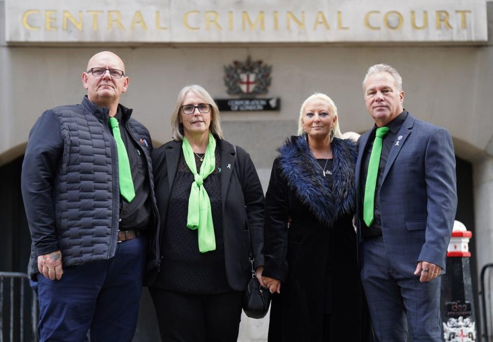 The family of Harry Dunn (left to right) father Tim Dunn, stepmother Tracey Dunn, mother Charlotte Charles and stepfather Bruce Charles pose outside the Old Bailey (PA)