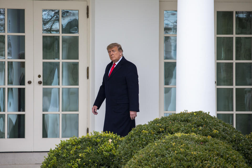 WASHINGTON, DC - DECEMBER 31: U.S. President Donald Trump walks to the Oval Office while arriving back at the White House on December 31, 2020 in Washington, DC.  President Trump and the First Lady returned to Washington, DC early and will not be in attendance at the annual New Years Eve party at his Mar-a-Lago home in Palm Beach. (Photo by Tasos Katopodis/Getty Images)