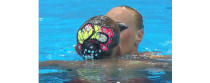 During their synchronized swimming finals routine, Ukrainians Daria Iushko and Kysenia Sydorenko shared this quick and surprising kiss.