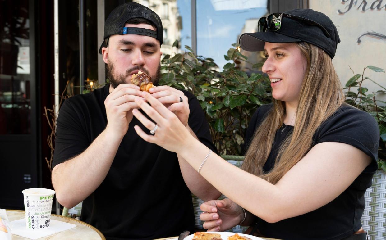 John and Kelsey Healy, both 23 and from Boston, try the famous crookie