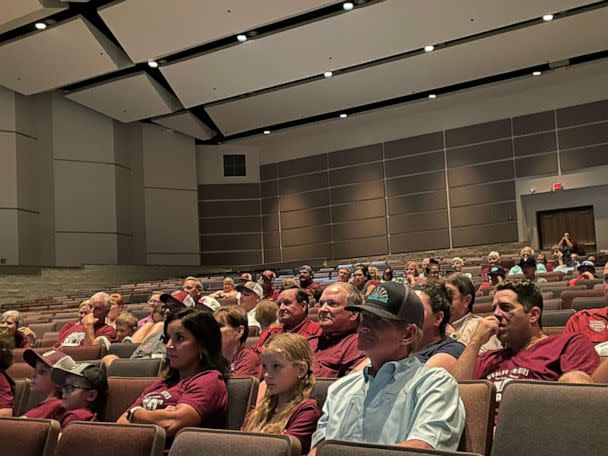 PHOTO: Families watch the Uvalde 1972 football championship at the Uvalde High School auditorium Sept. 3, 2022. (Emily Shapiro/ABC News)