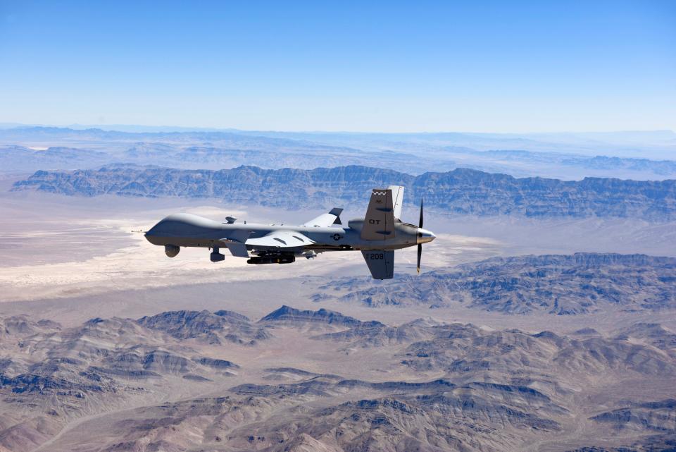 An MQ-9 Reaper remotely piloted aircraft piloted by Airmen from the 556 Test and Evaluation Squadron flies over the Nevada Test and Training Range and performs live-fire exercises with Air-to-Ground Missile-114 Hellfire missiles and Guided Bomb Unit-12 Paveway IIs, Aug. 30, 2023.