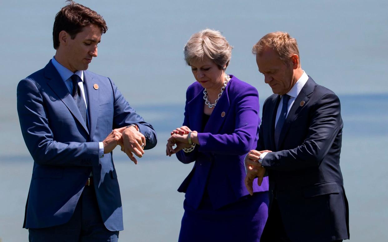 In sync? G7 host leader Justin Trudeau with Theresa May and Donald Tusk in La Malbraie - AFP